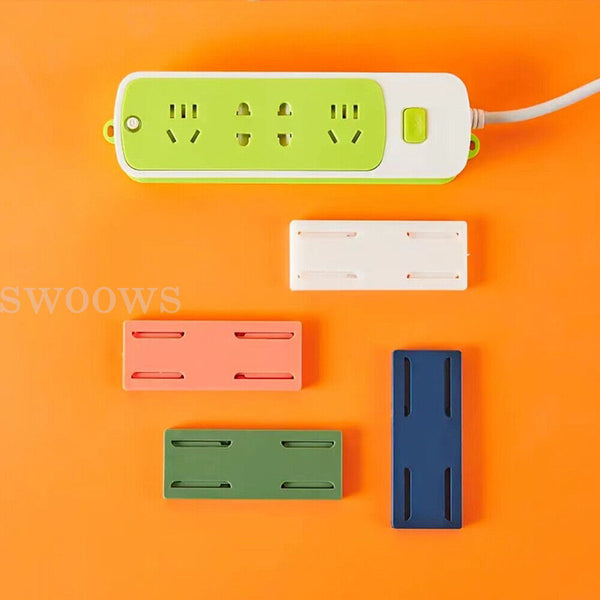 Wall Mount Plug Fixer Self-Adhesive Power Strip Plug Holder Socket Organizer