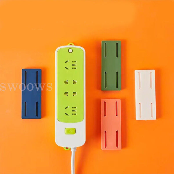 Wall Mount Plug Fixer Self-Adhesive Power Strip Plug Holder Socket Organizer